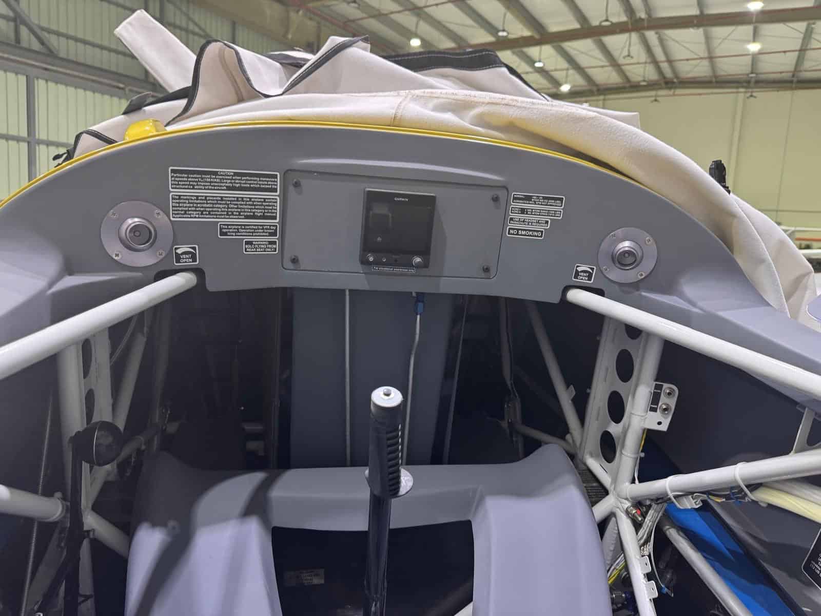 Rear cockpit of Extra 330LX HZ-XF98 with structural frame and secondary controls